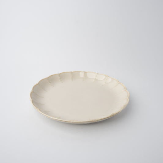 Handmade 21cm ceramic side plate in ivory glaze with scalloped edge