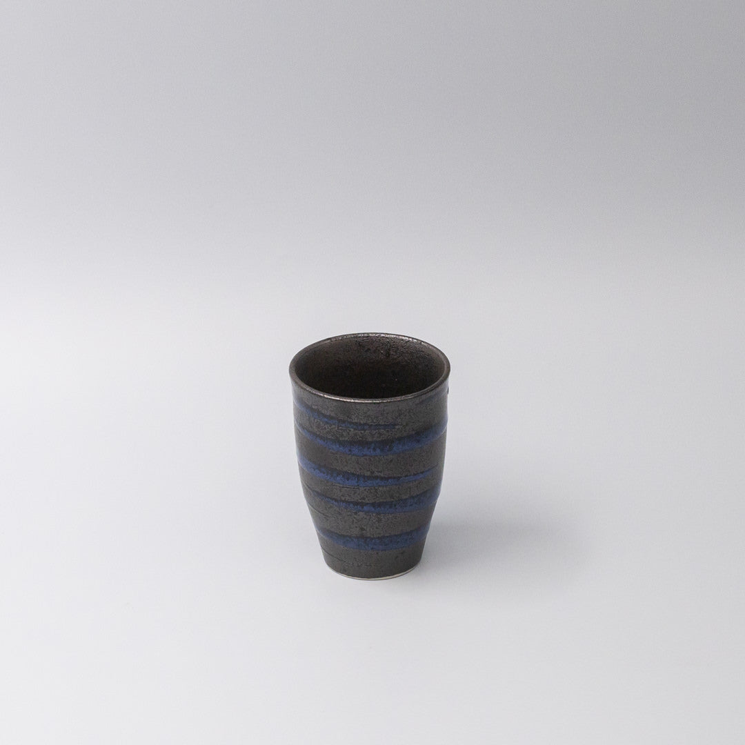 Handcrafted ceramic sushi mug with bright blue spiral pattern on black base, Japanese tableware for serving green tea, miso soup, or hot beverages