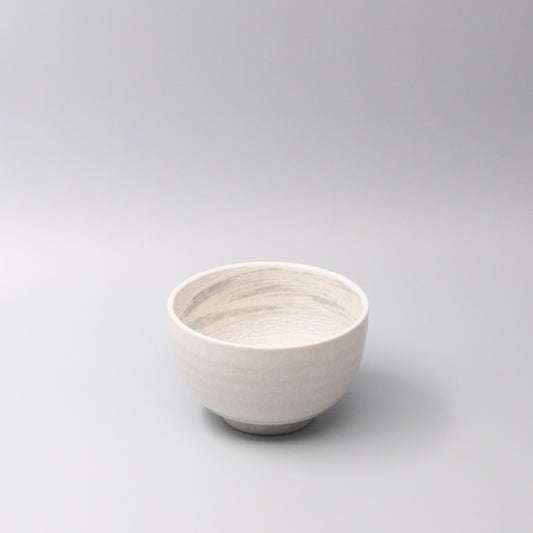 Handcrafted 16cm Japanese ceramic bowl in grey swirl glaze, versatile for serving noodles, rice, salads, or side dishes