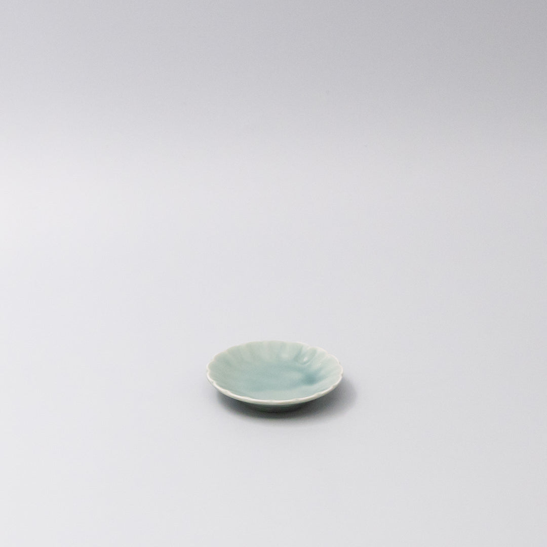Japanese mamezara small dish with scalloped edges in soft aqua glaze, perfect for soy sauce, dipping oils, or small treats