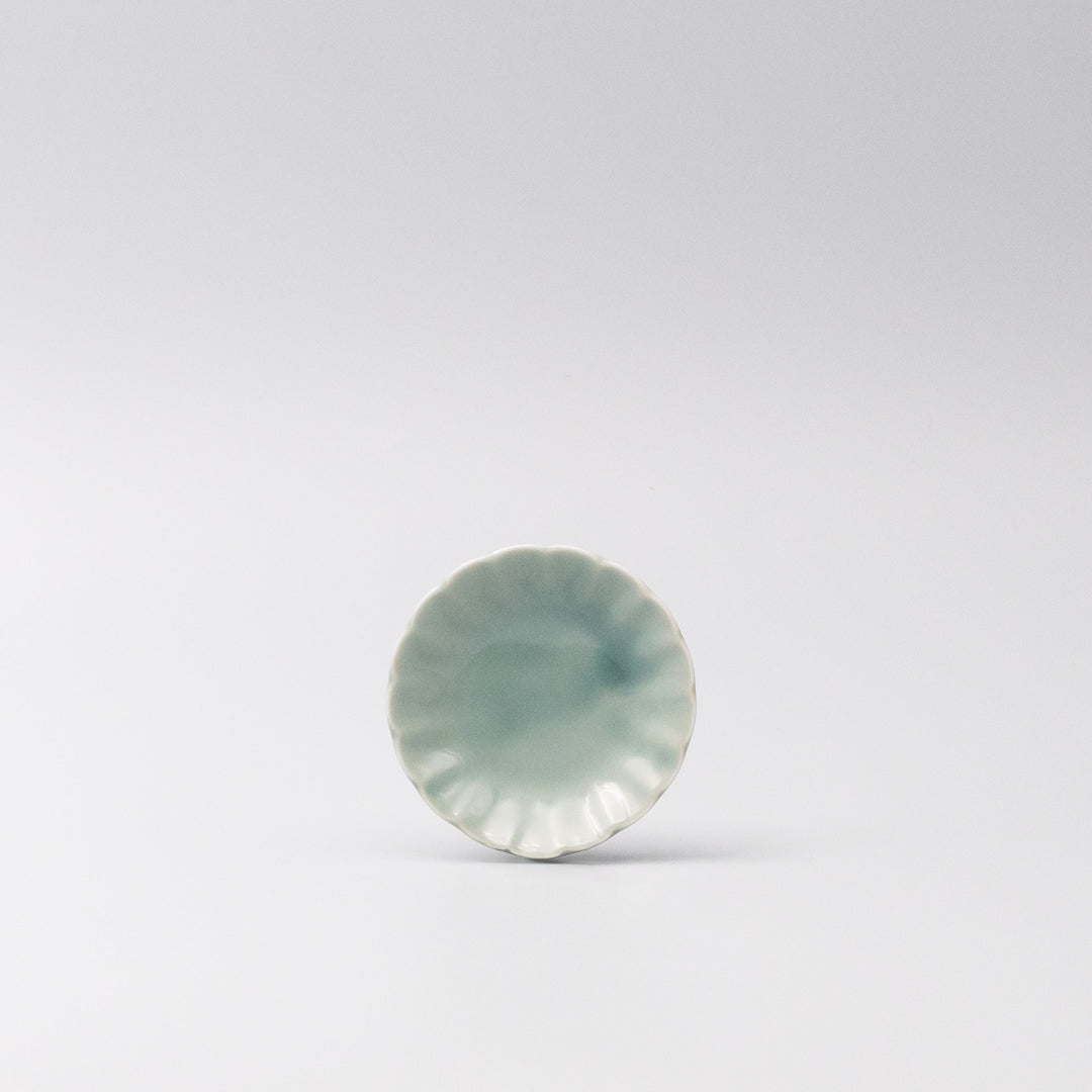 Japanese mamezara small dish with scalloped edges in soft aqua glaze, perfect for soy sauce, dipping oils, or small treats