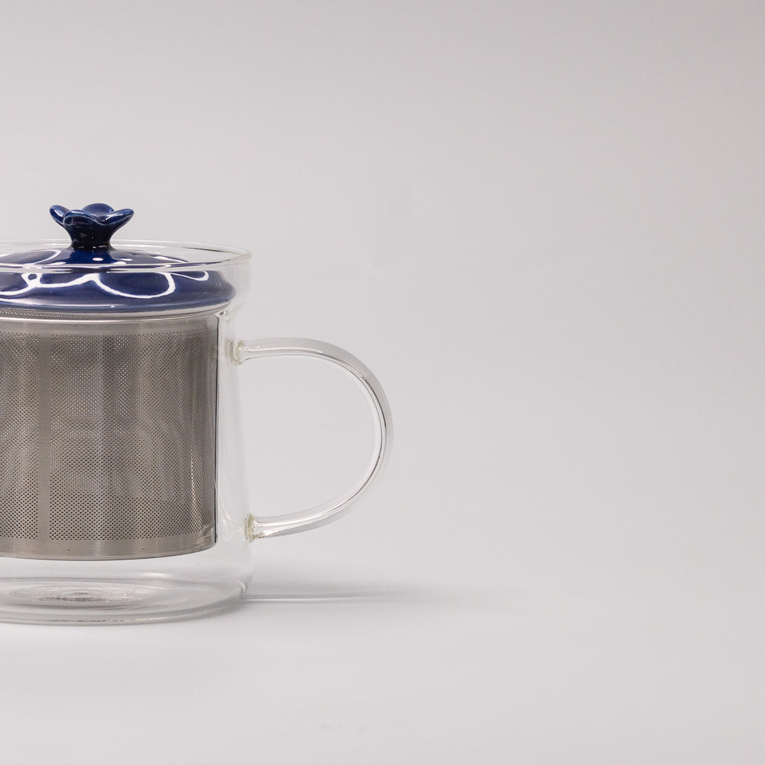 indigo floral glass teapot close up