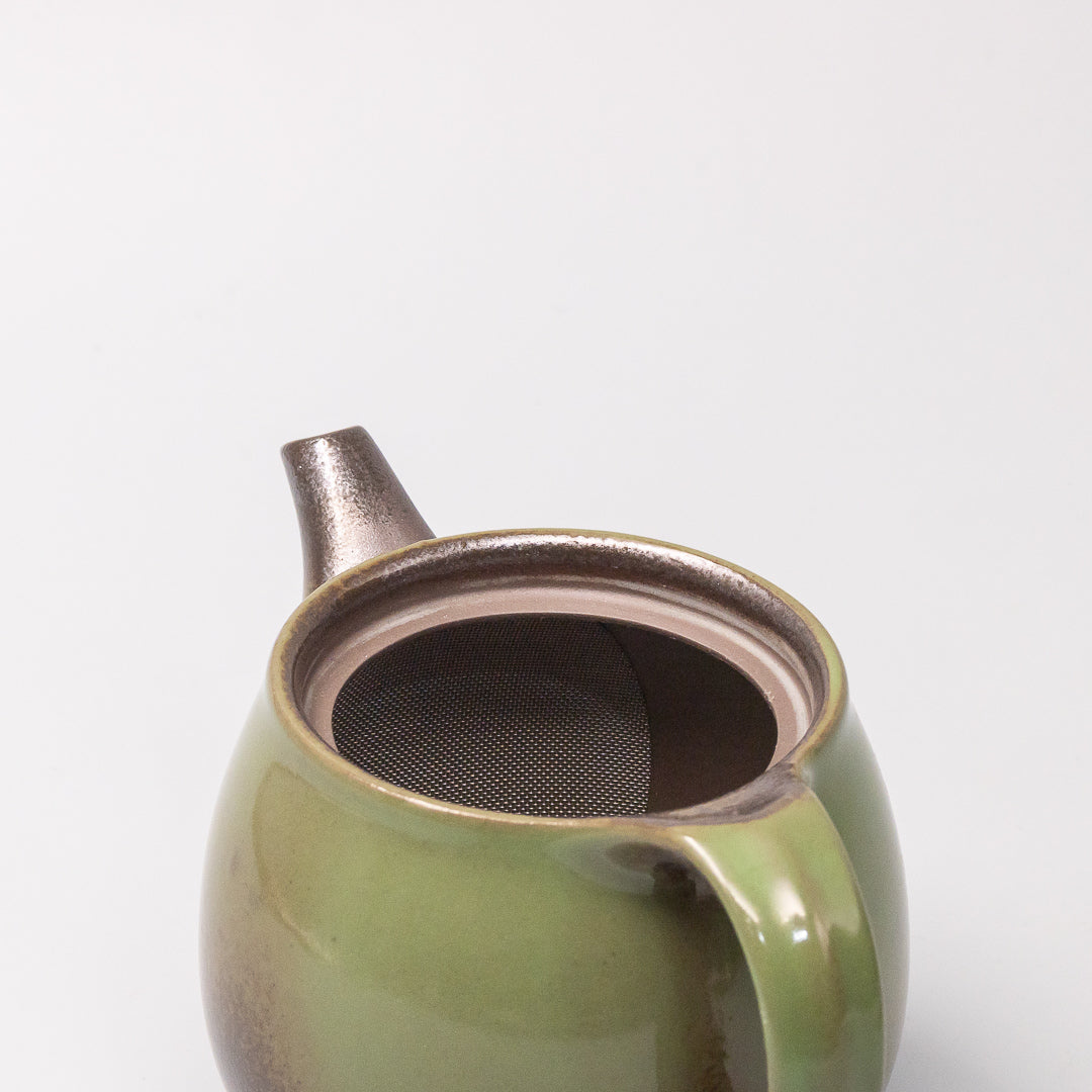 handcrafted Moss Green tea pot close up