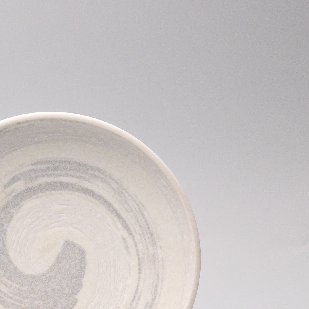 handcrafted grey swirl side plate close up