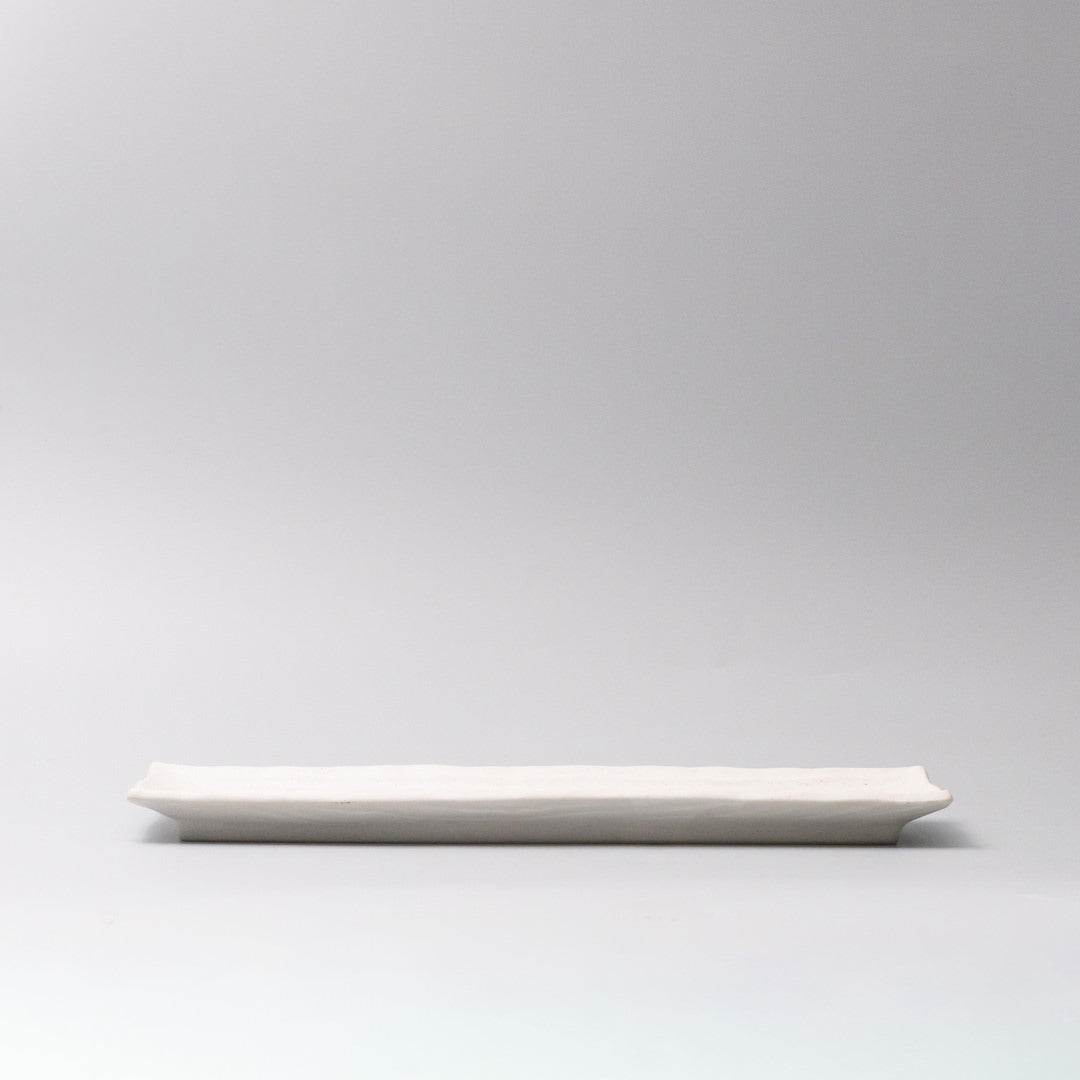 Rectangular sashimi plate matte white glaze side view Japanese ceramic serving plate