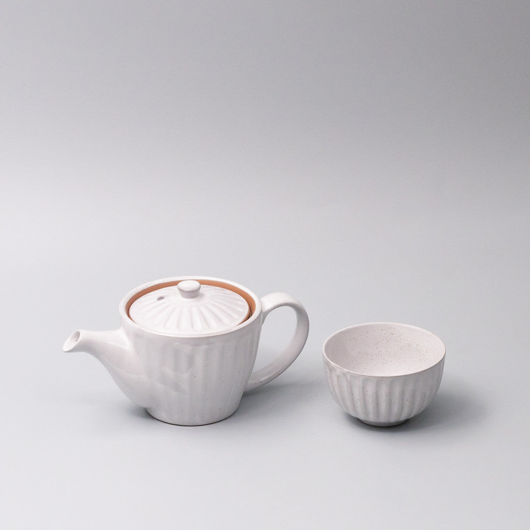 Ridged glaze teapot with warm white finish