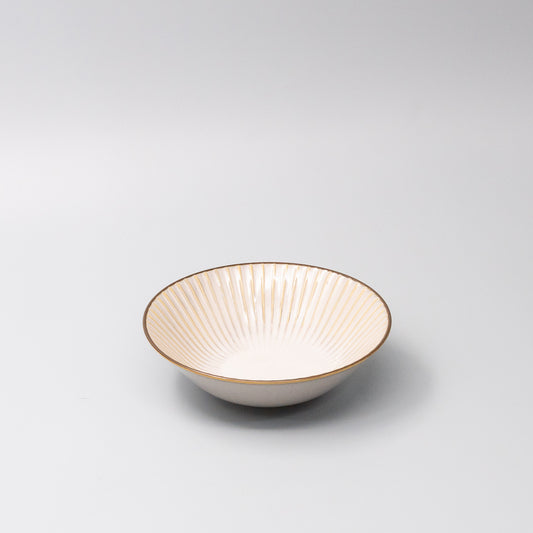 Japanese ceramic bowl with White Sendan glaze and radiating line pattern