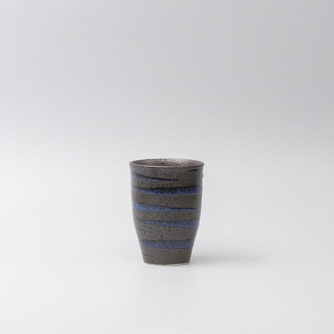 Handcrafted ceramic sushi mug with bright blue spiral pattern on black base, Japanese tableware for serving green tea, miso soup, or hot beverages