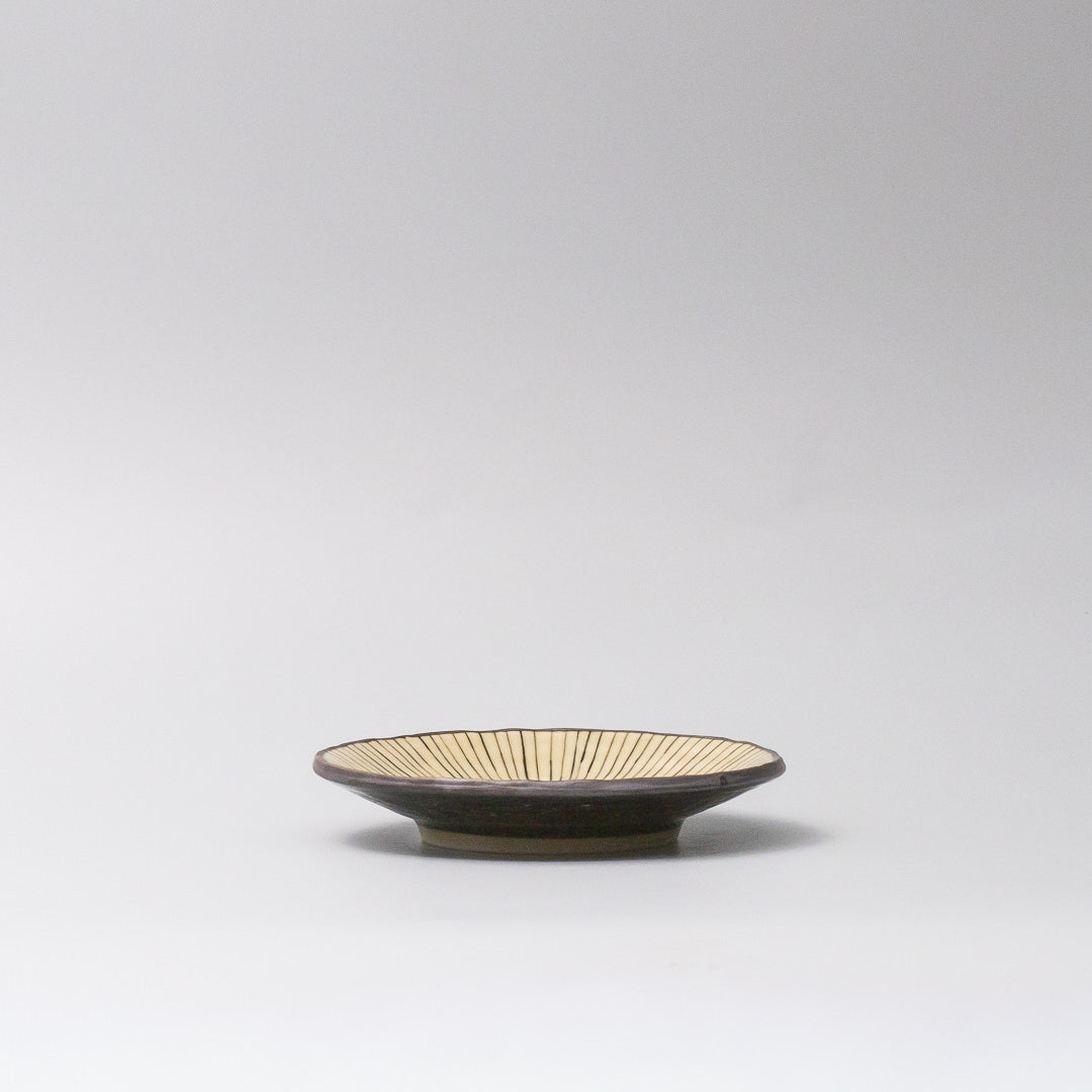 13.5cm ceramic saucer beige green radial glaze side view textured 