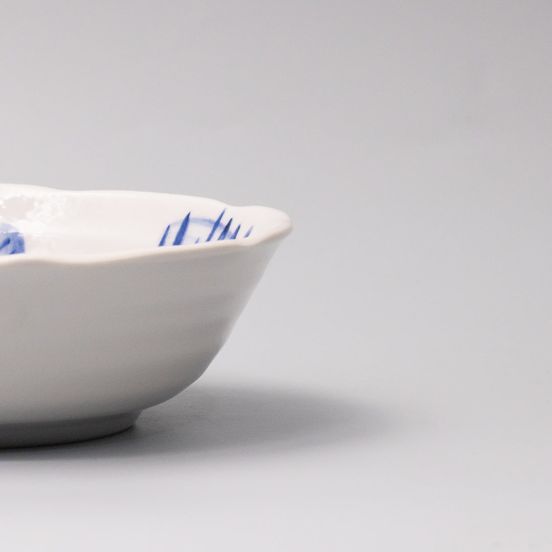 blue fish illustration ceramic bowl close up