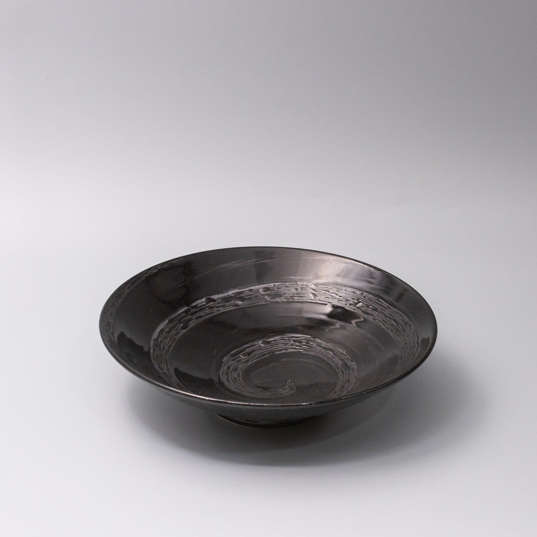 28cm black swirl glaze shallow serving bowl 45 degree view Japanese ceramic tableware