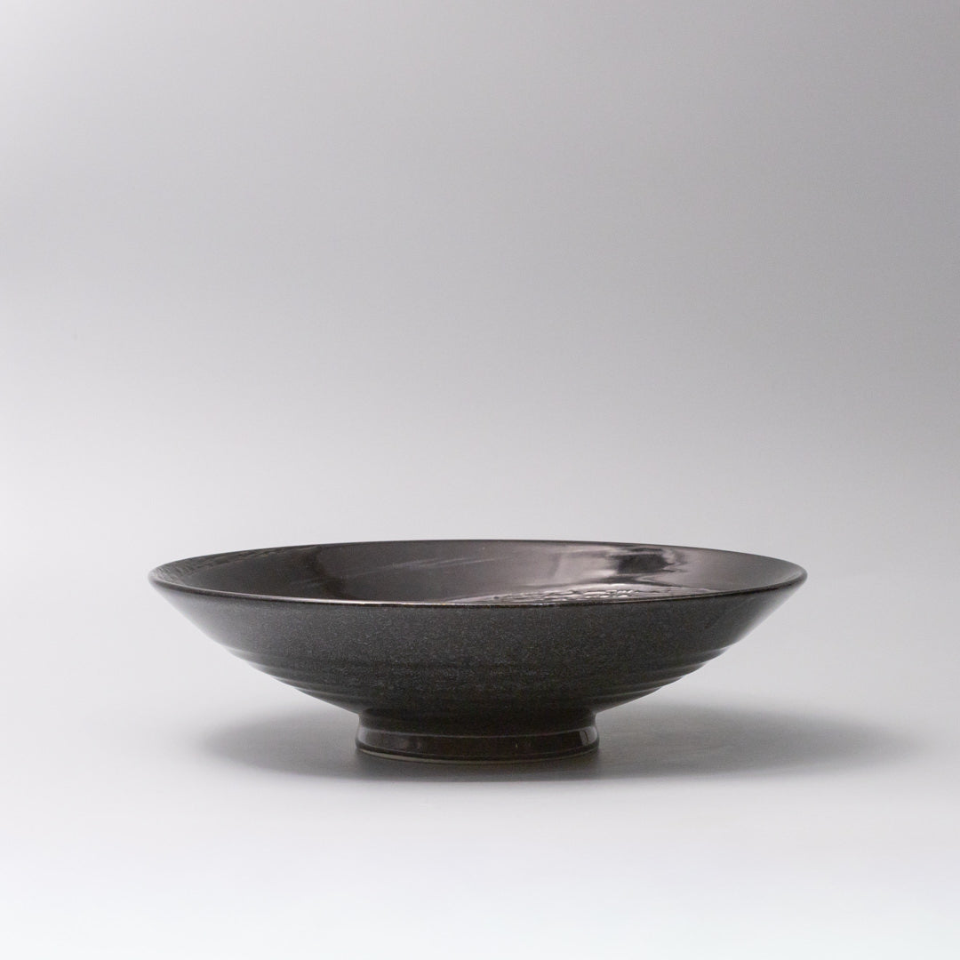 28cm black swirl ceramic shallow serving bowl side view Japanese tableware