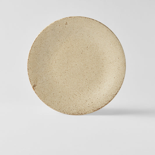 Top view of Japanese ceramic plate in natural beige glaze