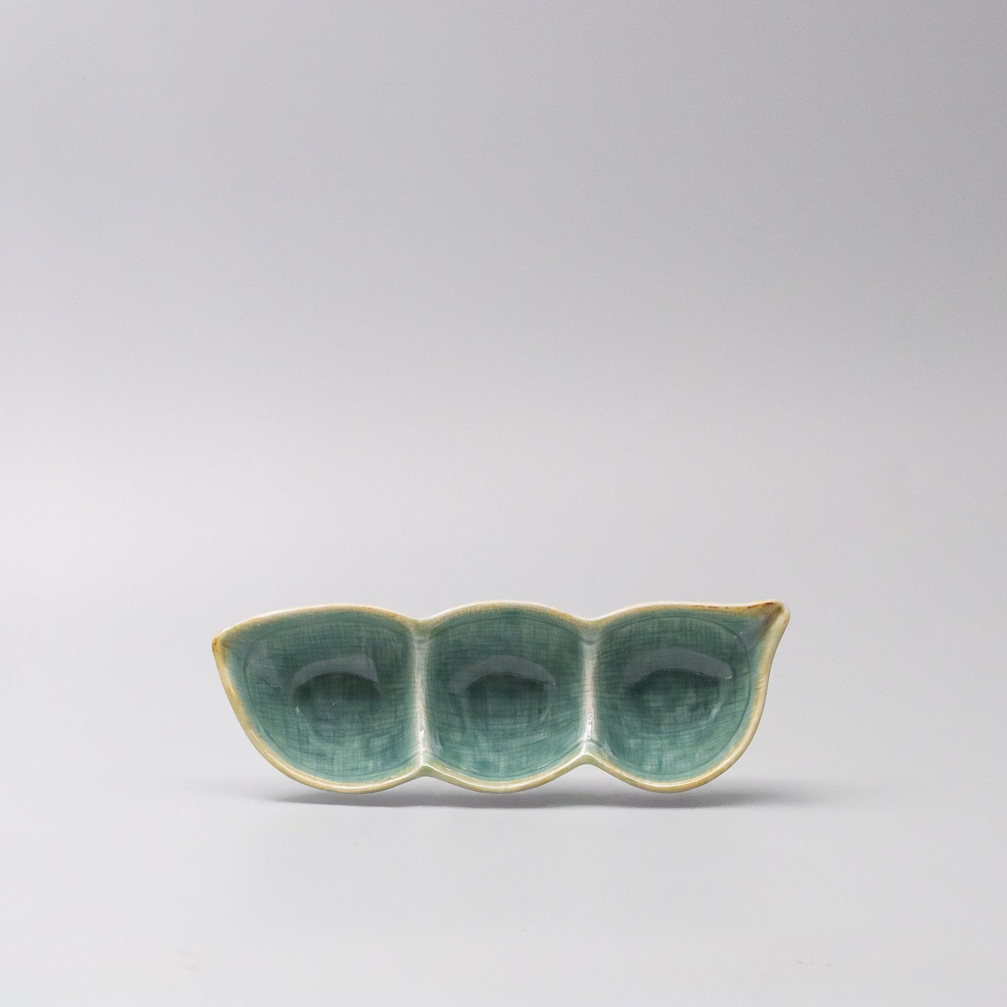 Edamame Triple Pod Dish 20cm Celadon Glaze angled view showing three serving sections