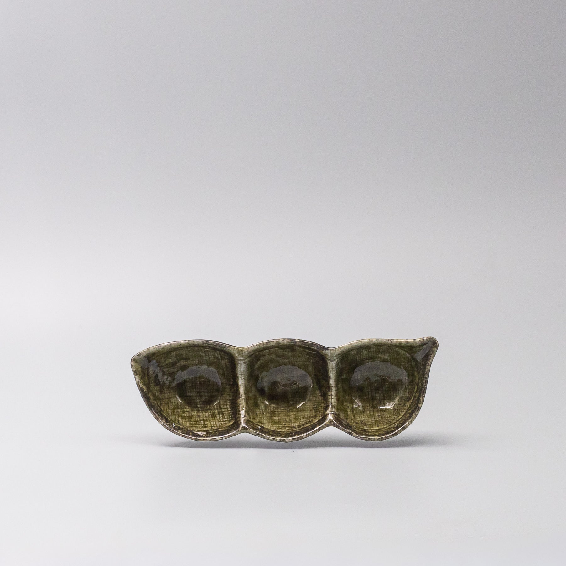 Front view of Green Glaze Edamame Triple Pod Dish made in Japan