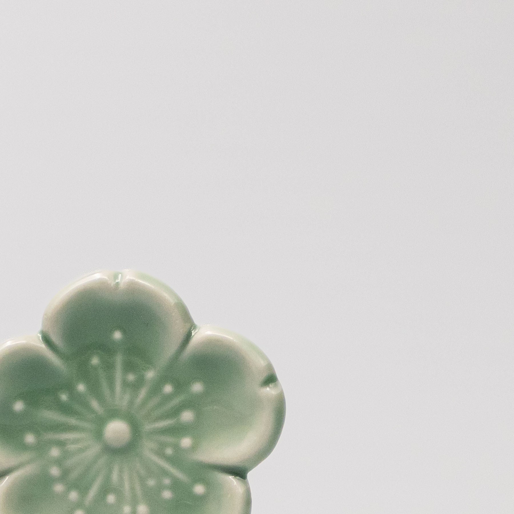 Close-up of the Green Sakura glaze Chopsticks Rest