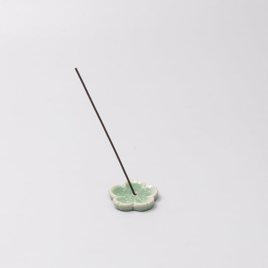 Japanese ceramic incense holder with green Sakura design