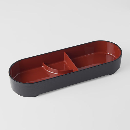 Japanese lacquerware oval bento tray with two compartments and sauce section