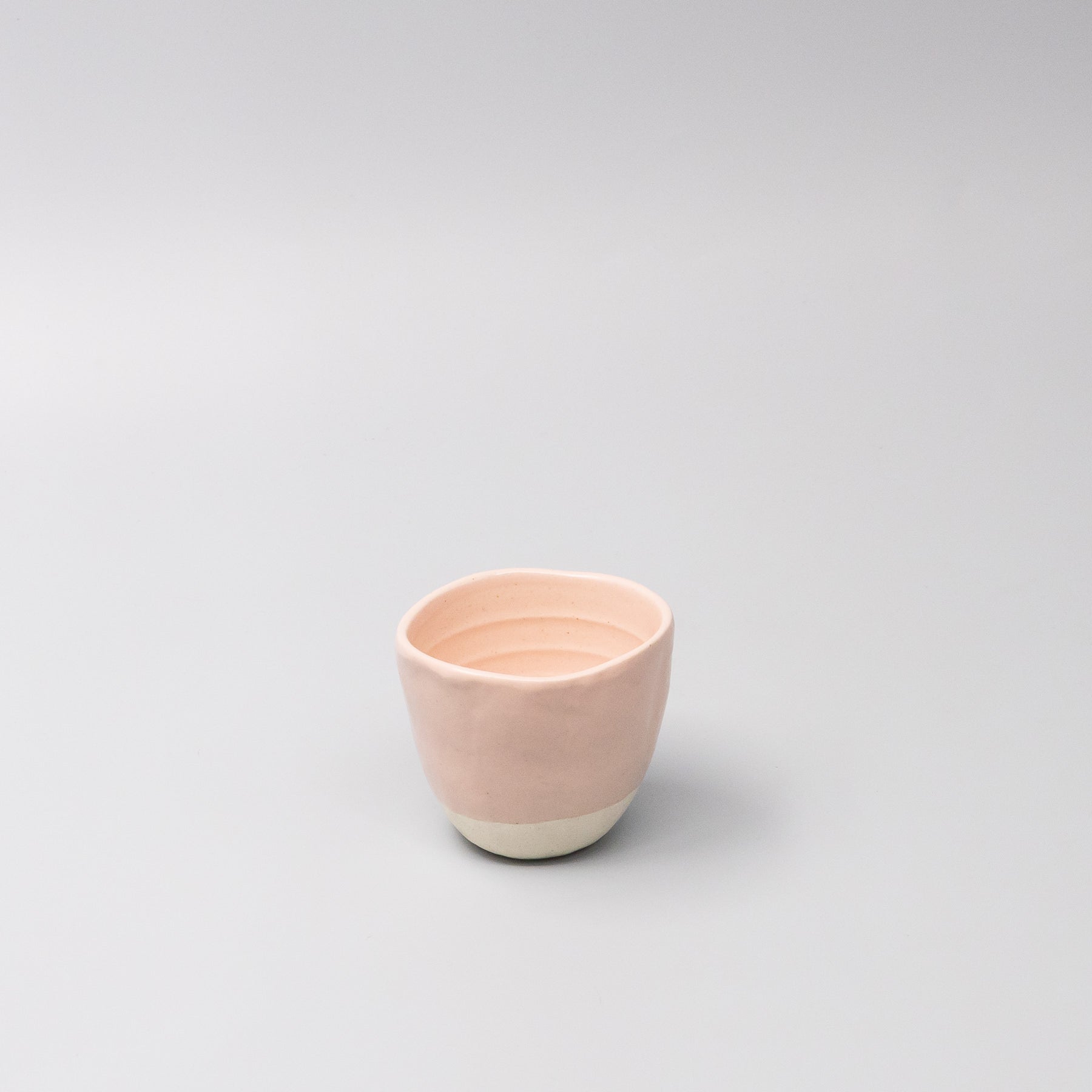 45-degree view of Sakura Pink Lopsided Mug