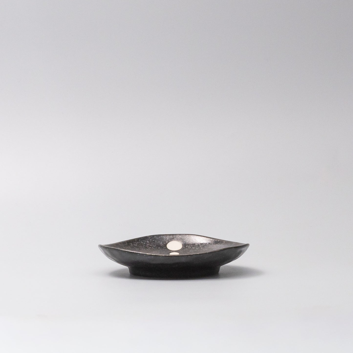 Side view of White Dot Design Organic Saucer 12cm