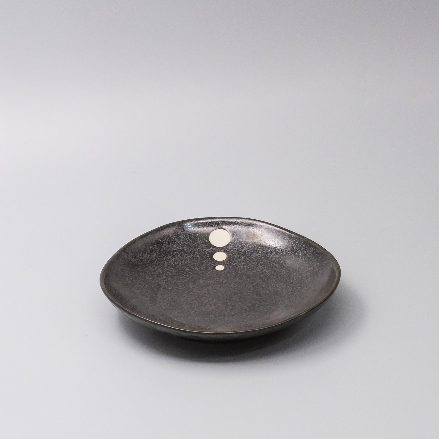 45-degree view of White Dot Design Organic Side Plate 19cm