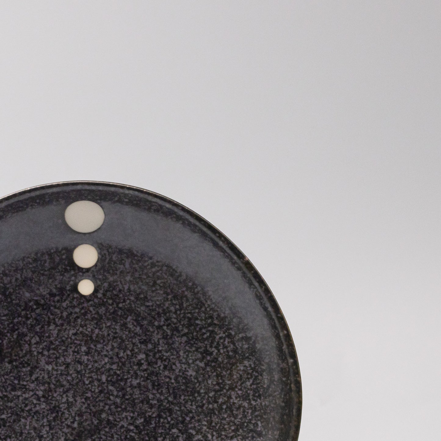 Close-up of the White Dot Design on the Organic Side Plate 19cm