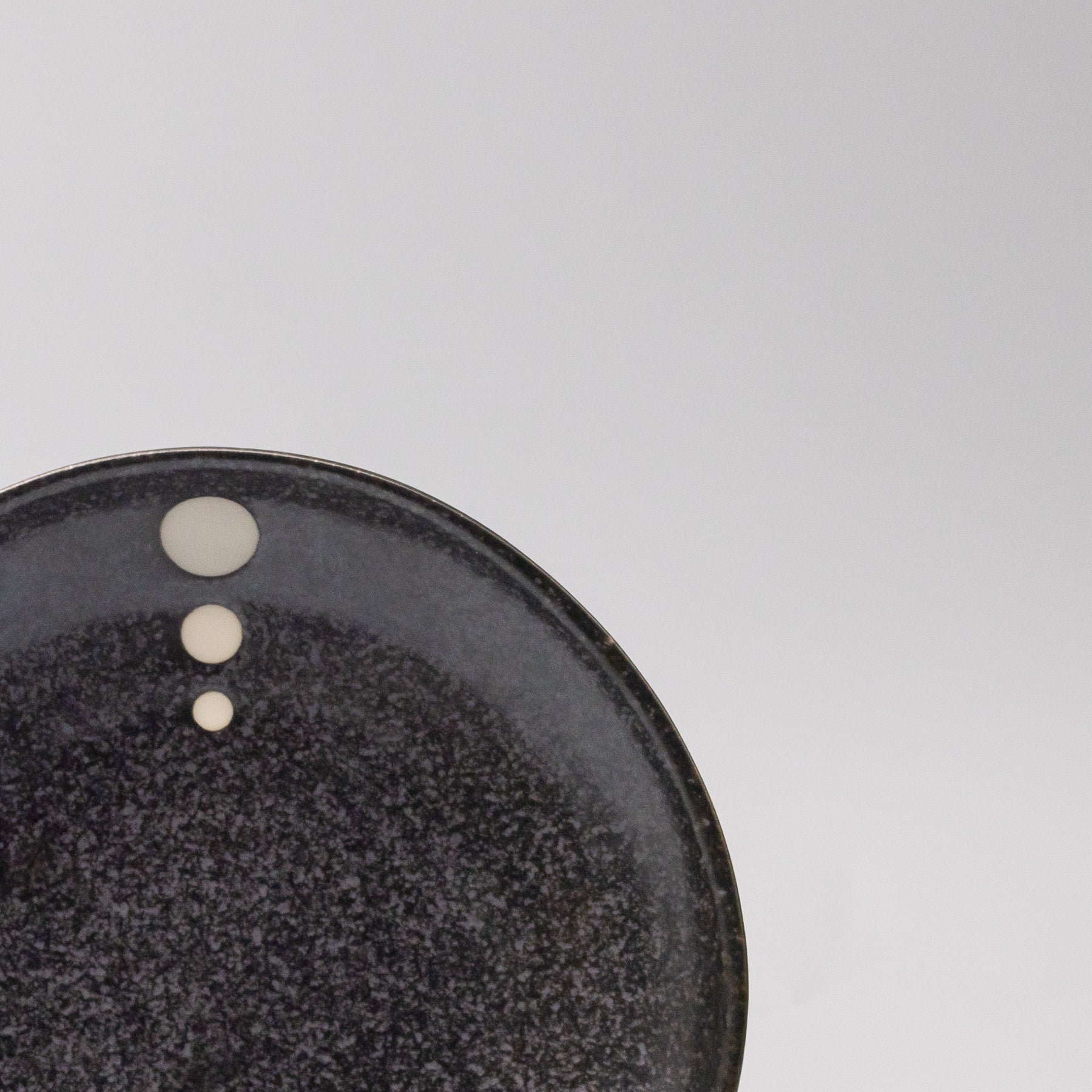 Close-up of the White Dot Design on the Organic Side Plate 19cm